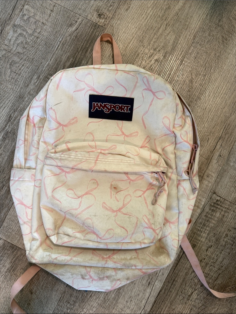 JanSport Cream Backpack with Pink Ribbon Print